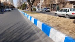 رنگ آمیزی جداول مابین تقاطع سرچشمه و خیابان فجر